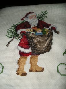 Santa offering to toys to little children