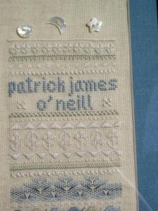 Patrick's Birth Sampler, Close-up of Top Third
