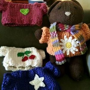 Baby Bobbi Bear with all his Sweaters and his Scarf